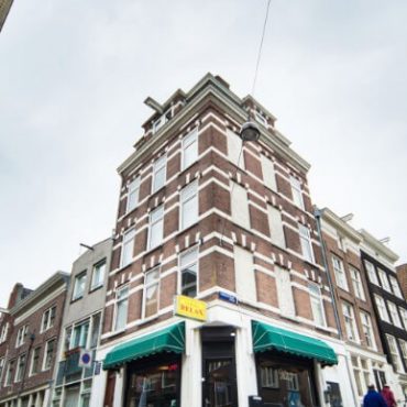 Street corner and marijuana dispensary building in Amsterdam. Local SEO tips for marijuana dispensaries. SEO for dispensaries. SEO for marijuana dispensaries. Cannabis marketing Agency.