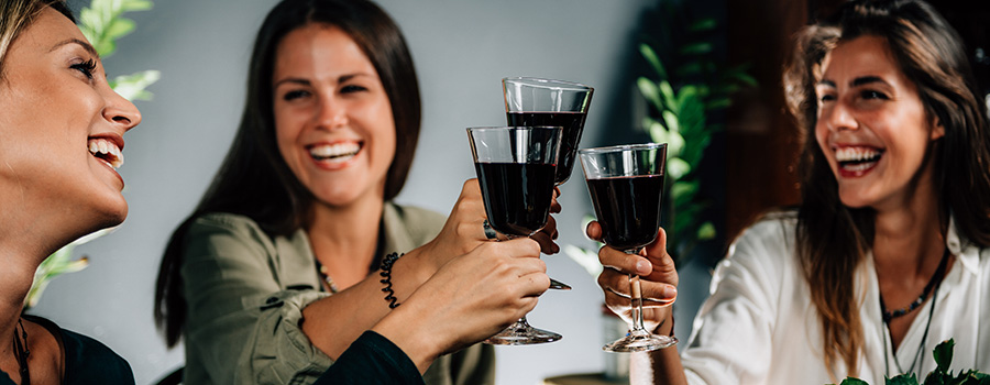 3 friends toasting cbd infused wine. how to market, sell, and advertise CBD onGoogle search. CBD marketing and advertising agency.