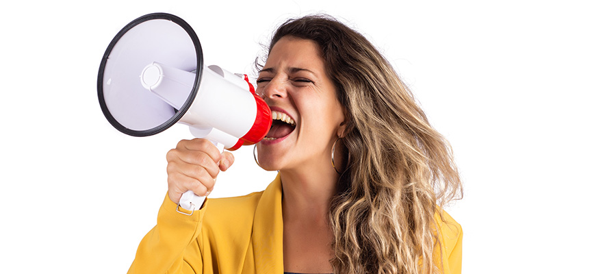 woman screaming on a megaphone. best cbd seo marketing strategy agency.